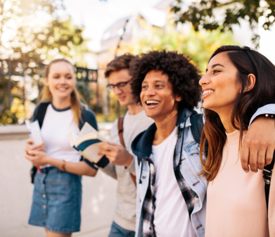 Group of college students walking outside