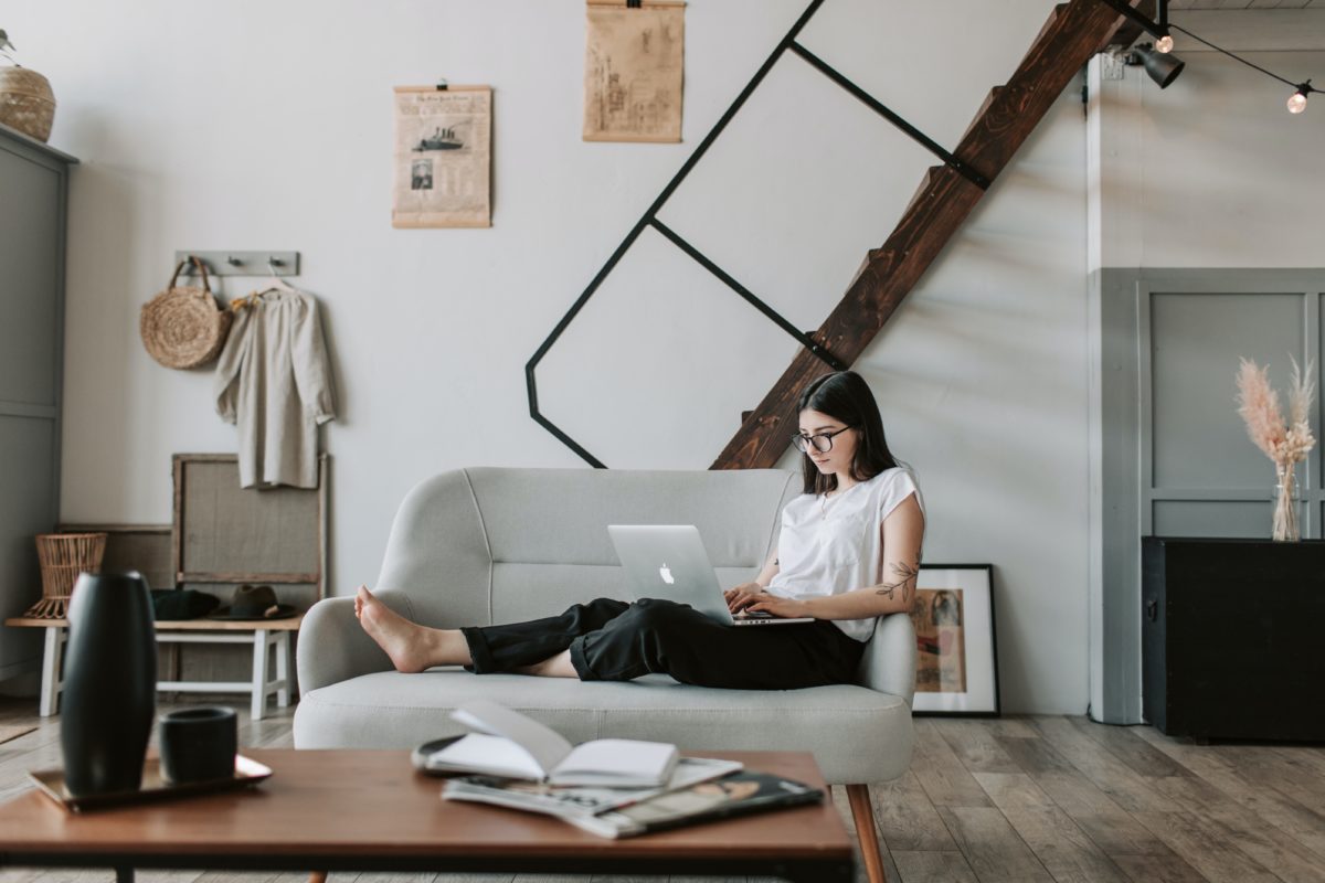 Woman at home doing online shopping