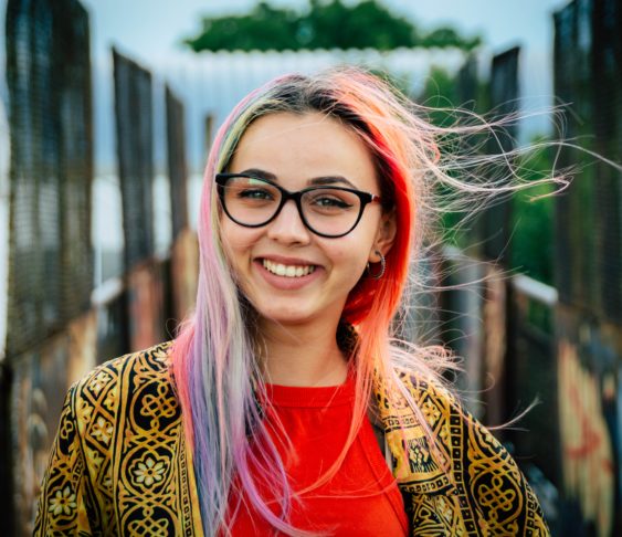 Women in glasses smiling