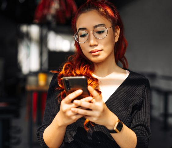 Woman working on her phone