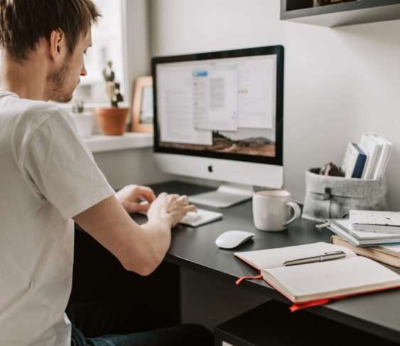 Man sitting on computer