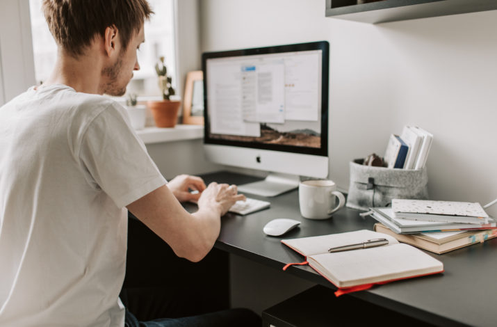 Man sitting on computer